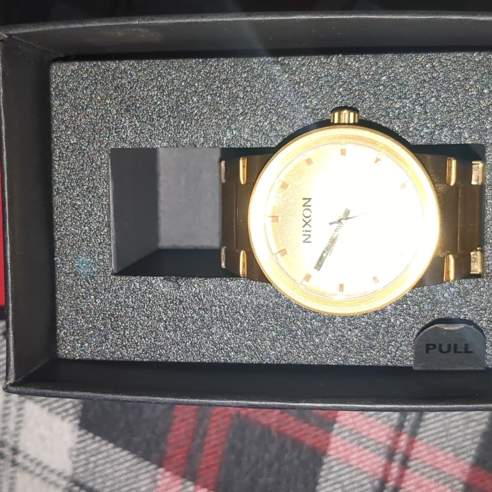 Nixon gold watch